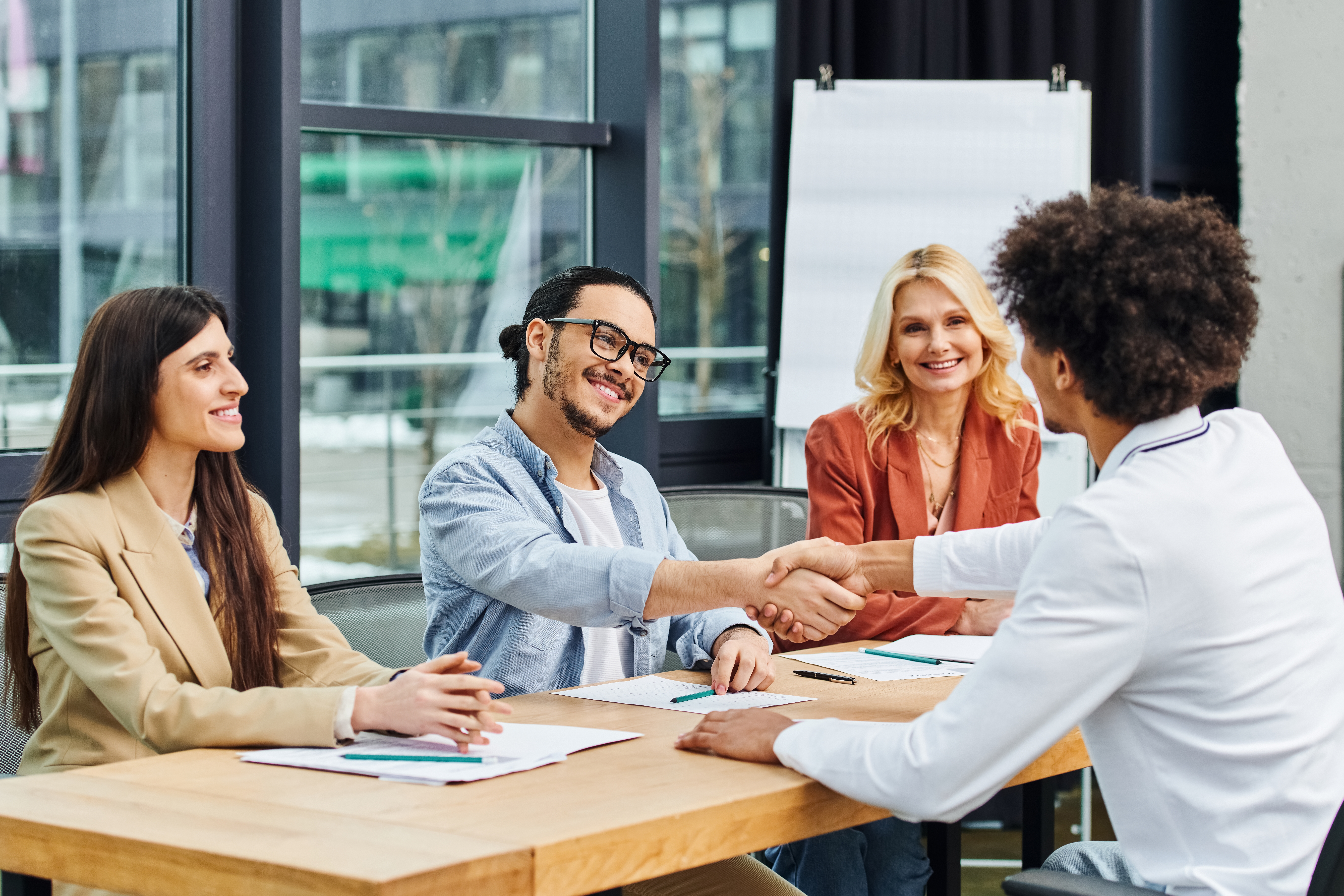 a direct marketing applicant shaking hands with interviewer