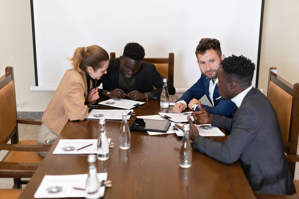 Colleagues planning initiatives to develop business leaders' direct sales growth